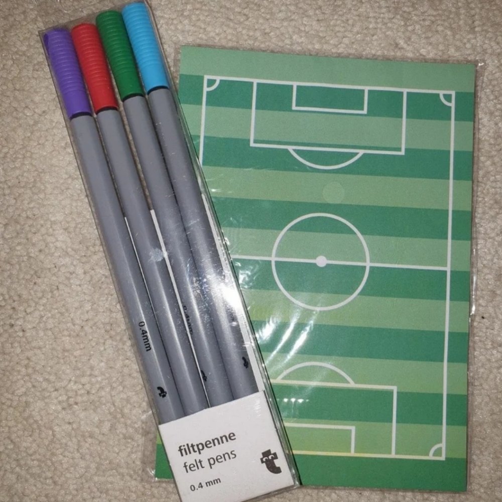 Soccer field notepad and pens